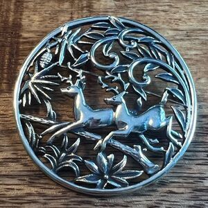 Silver tone holiday pin brooch